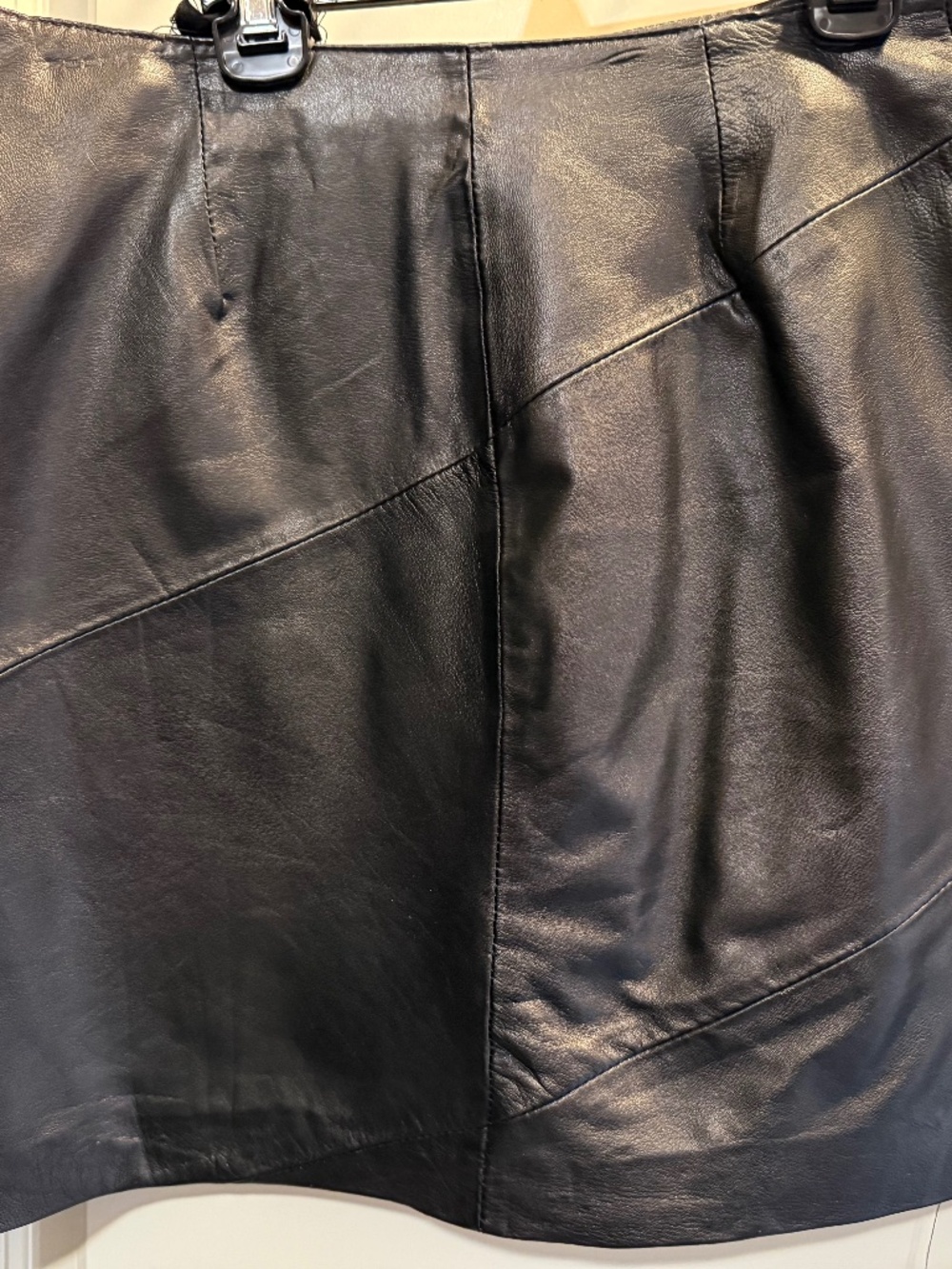 Black leather mini skirt